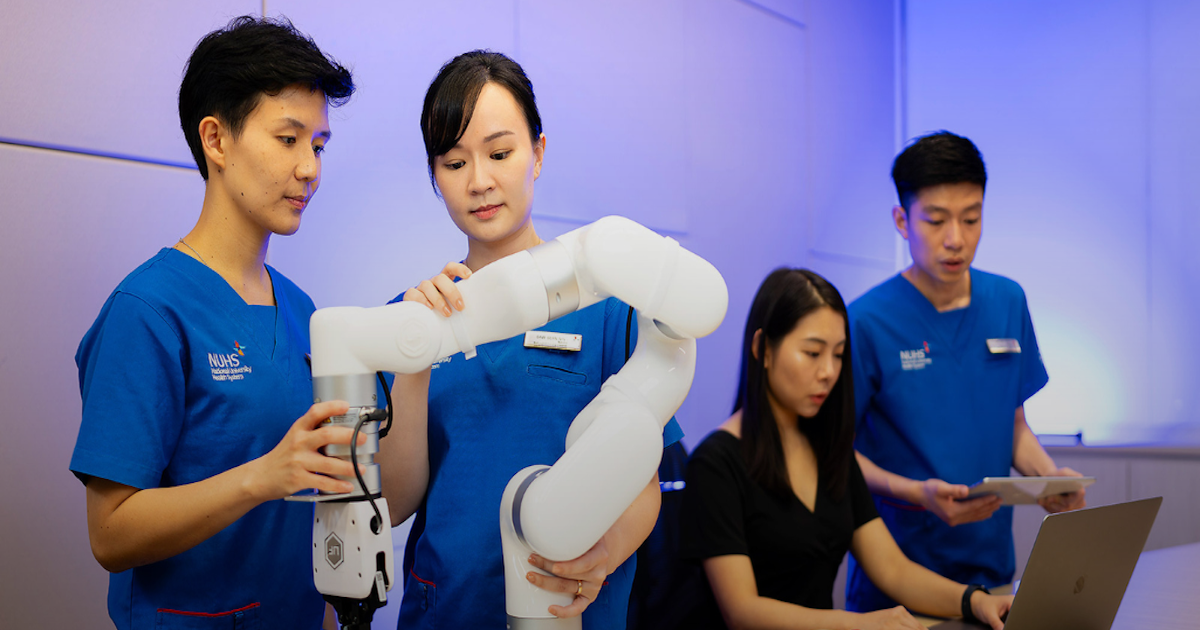 nurses working with robots